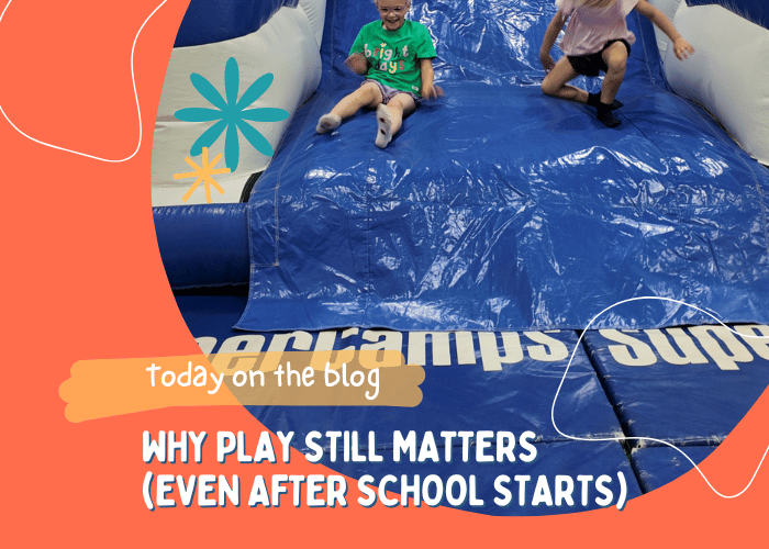 kids playing on giant inflatable